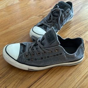 Grey converse with gems on the side. Size 9.